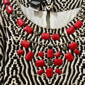 Animal print dress with red and bronze beads